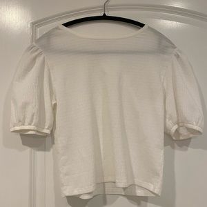White top with puffy sleeves